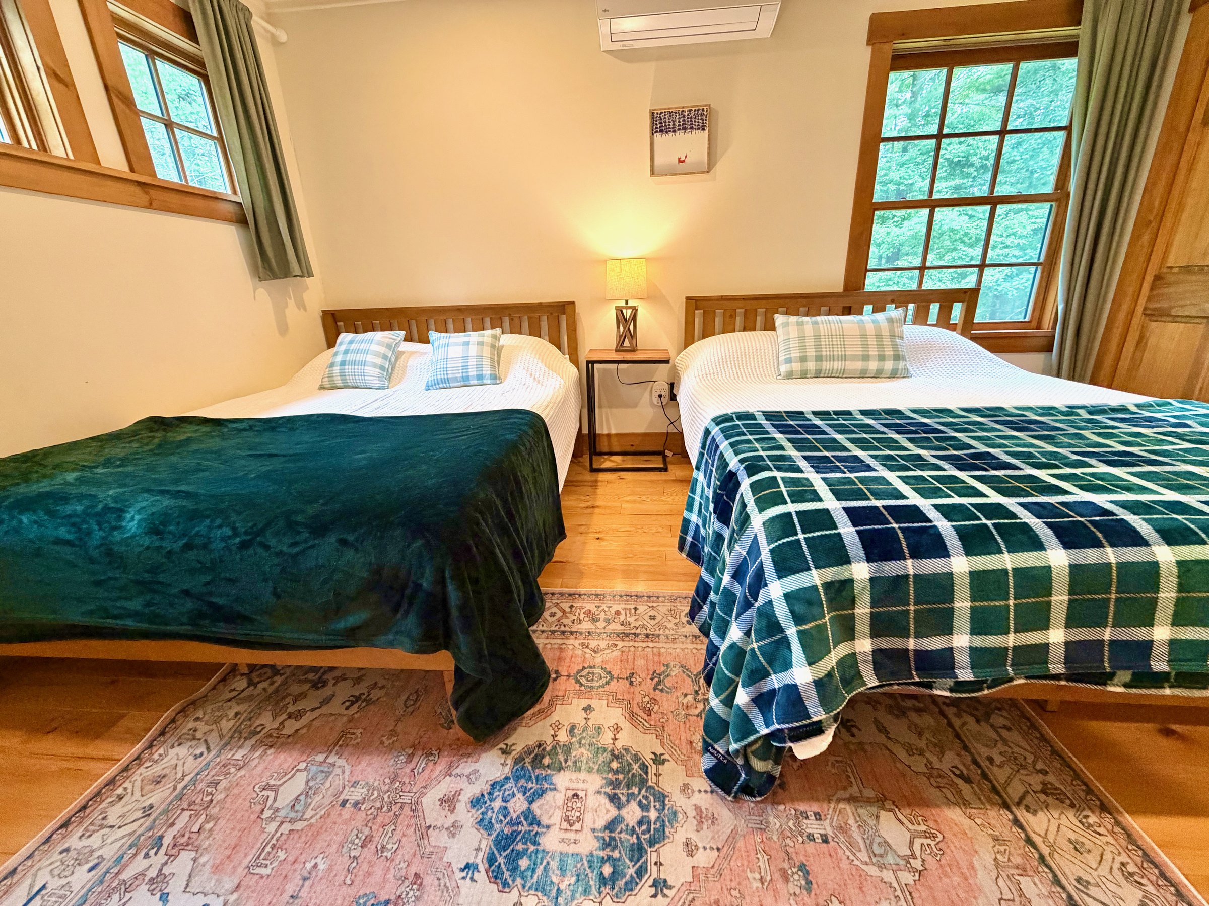 Snow Room with two queen beds at Wild Ausable Lodge